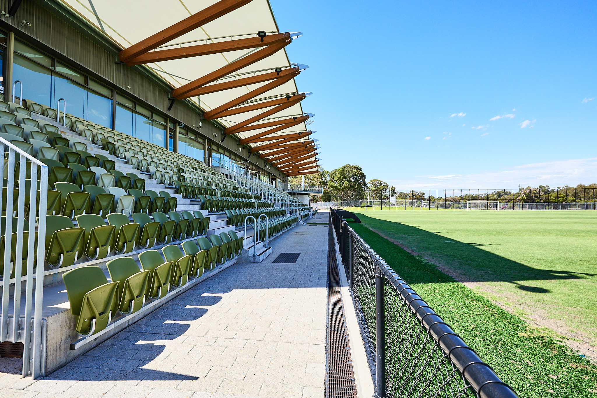 A close up photo of the grandstand seating at the Sam Kerr Football Centre in Queens Park, Perth