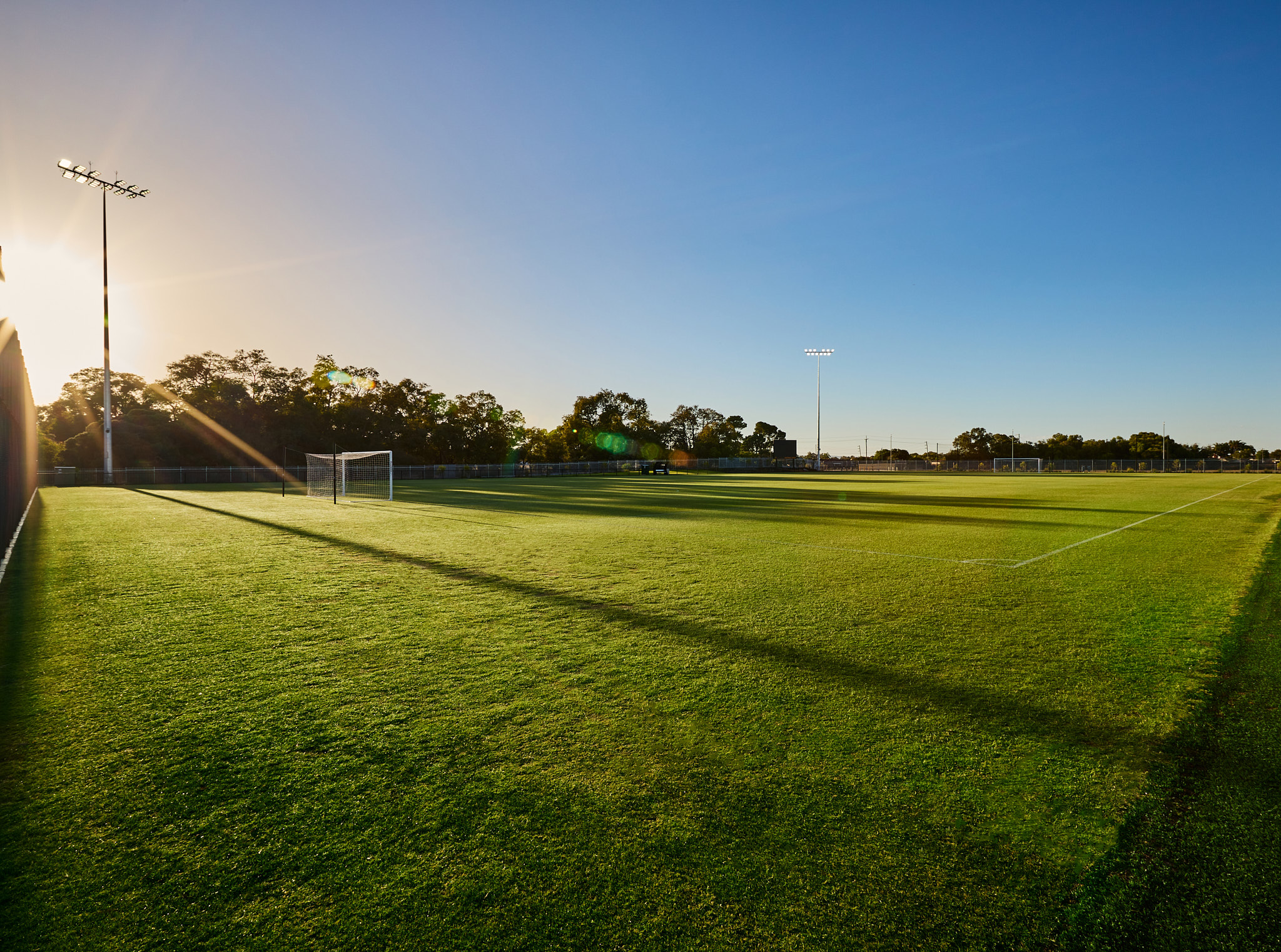 A photo of one of the grassed full sized playing pitches at the Sam Kerr Football Centre in Queens Park, Perth