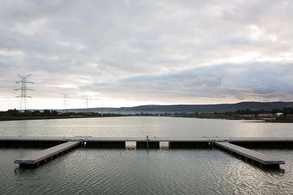 A photo of several launch pontoons protruding out from a jetty style walkway at the Champion Lakes Regatta Centre