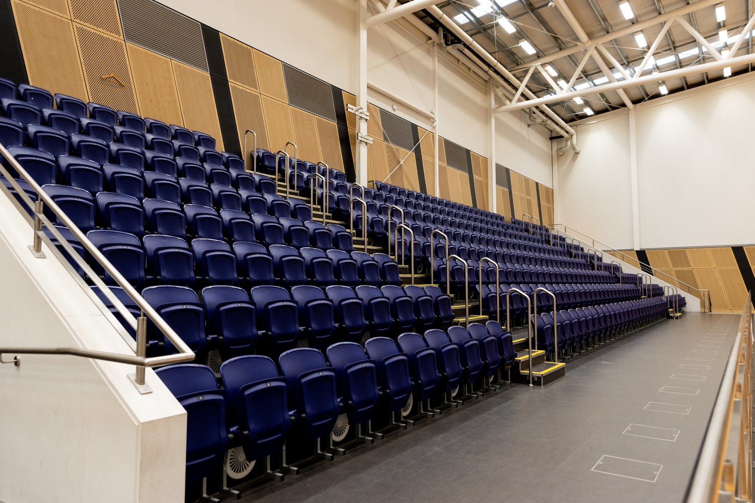 A photo of the seating bleaches inside the Gold Netball Centre