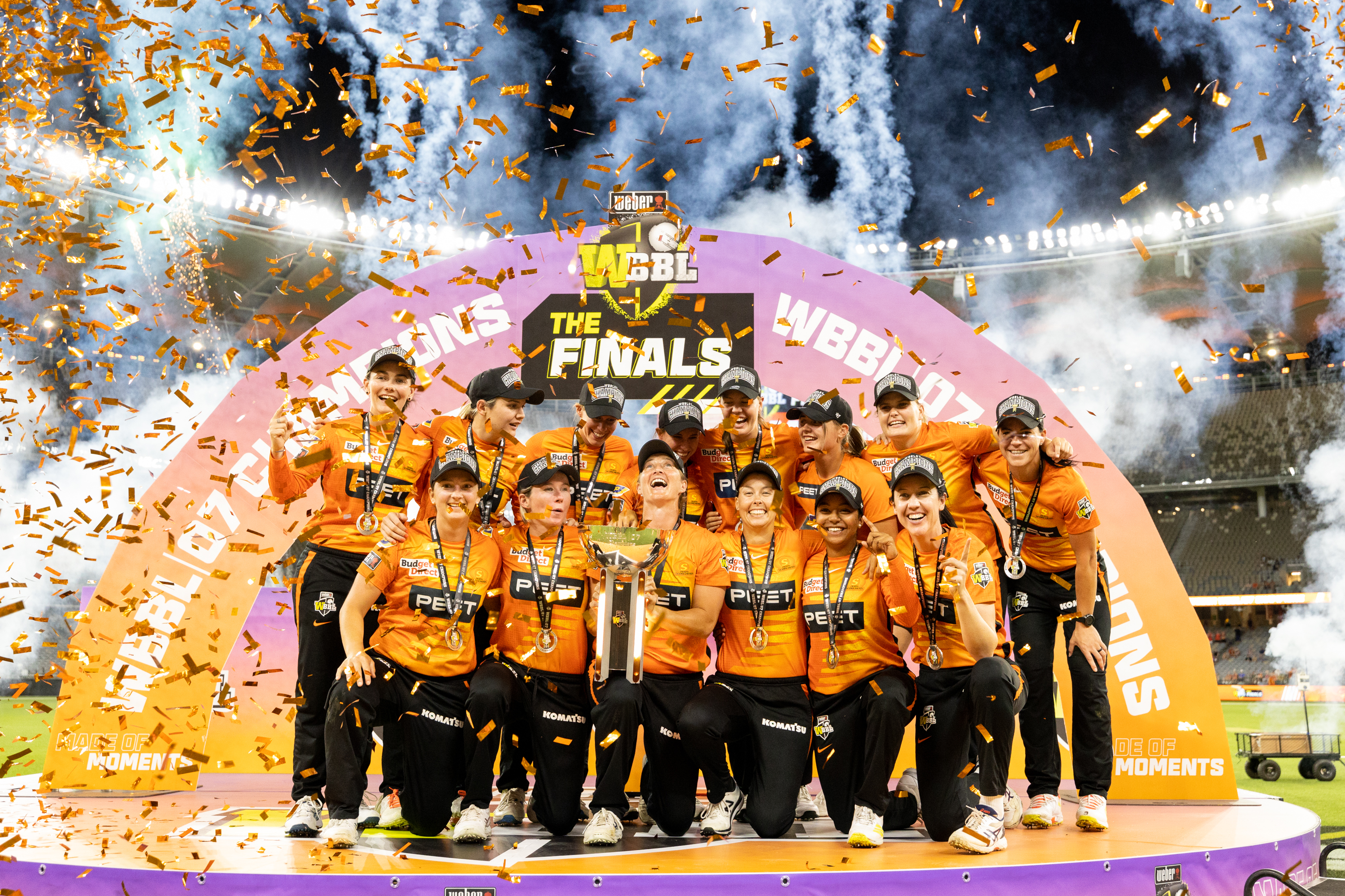 A photo of the Perth Scorchers cricket team celebrating a grand final victory at Optus Stadium