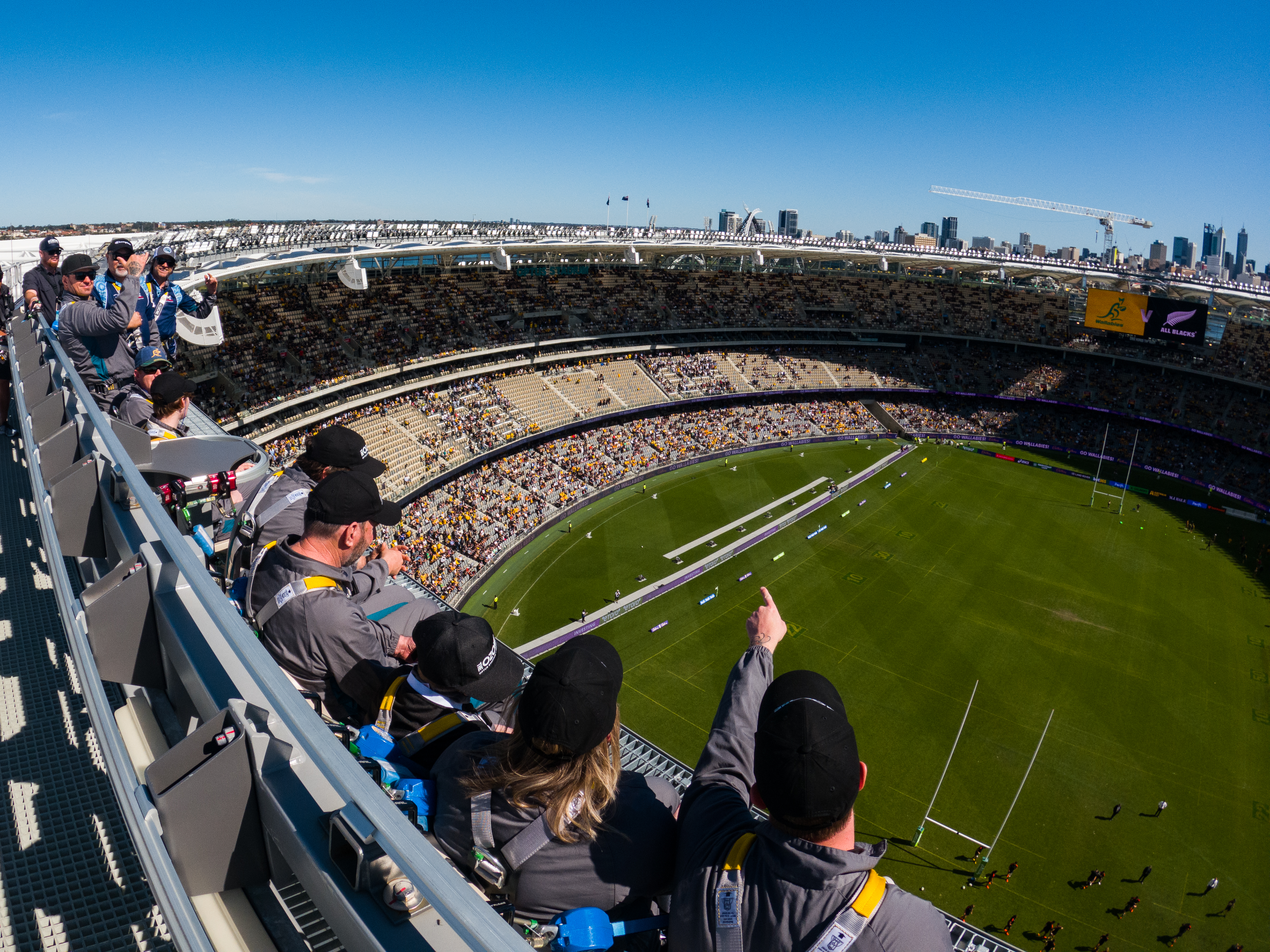 An aerial shot showcasing the view from the rooftop of Optus Stadium during a match