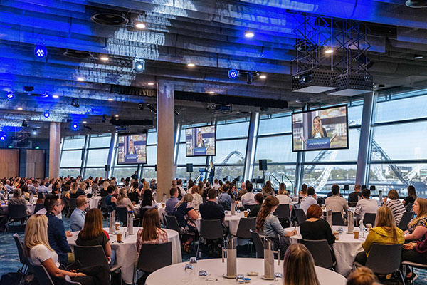 Photo of an event being held in a function room at Optus Stadium in Burswood, Perth