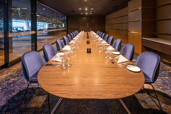 Photo of a boardroom like long table in a meeting room at Optus Stadium in Burswood, Perth