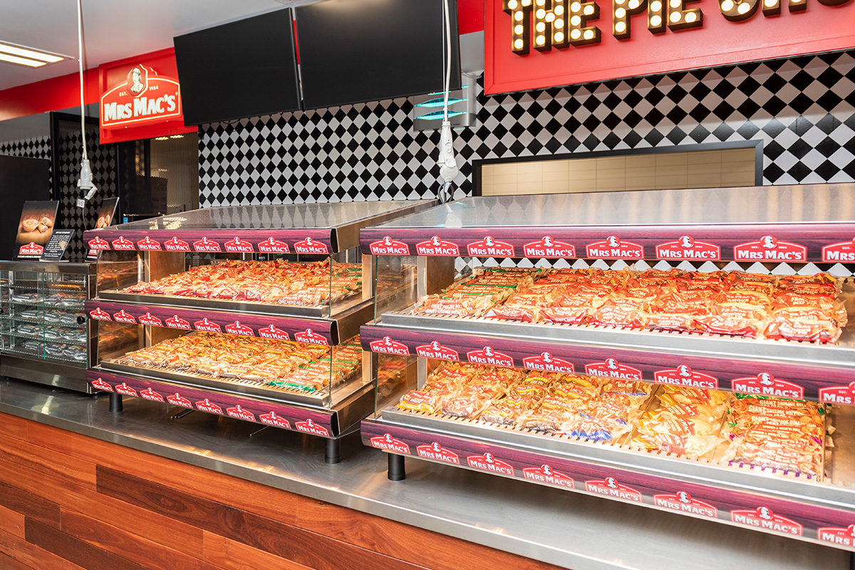 A photo of multiple display cabinets full of food