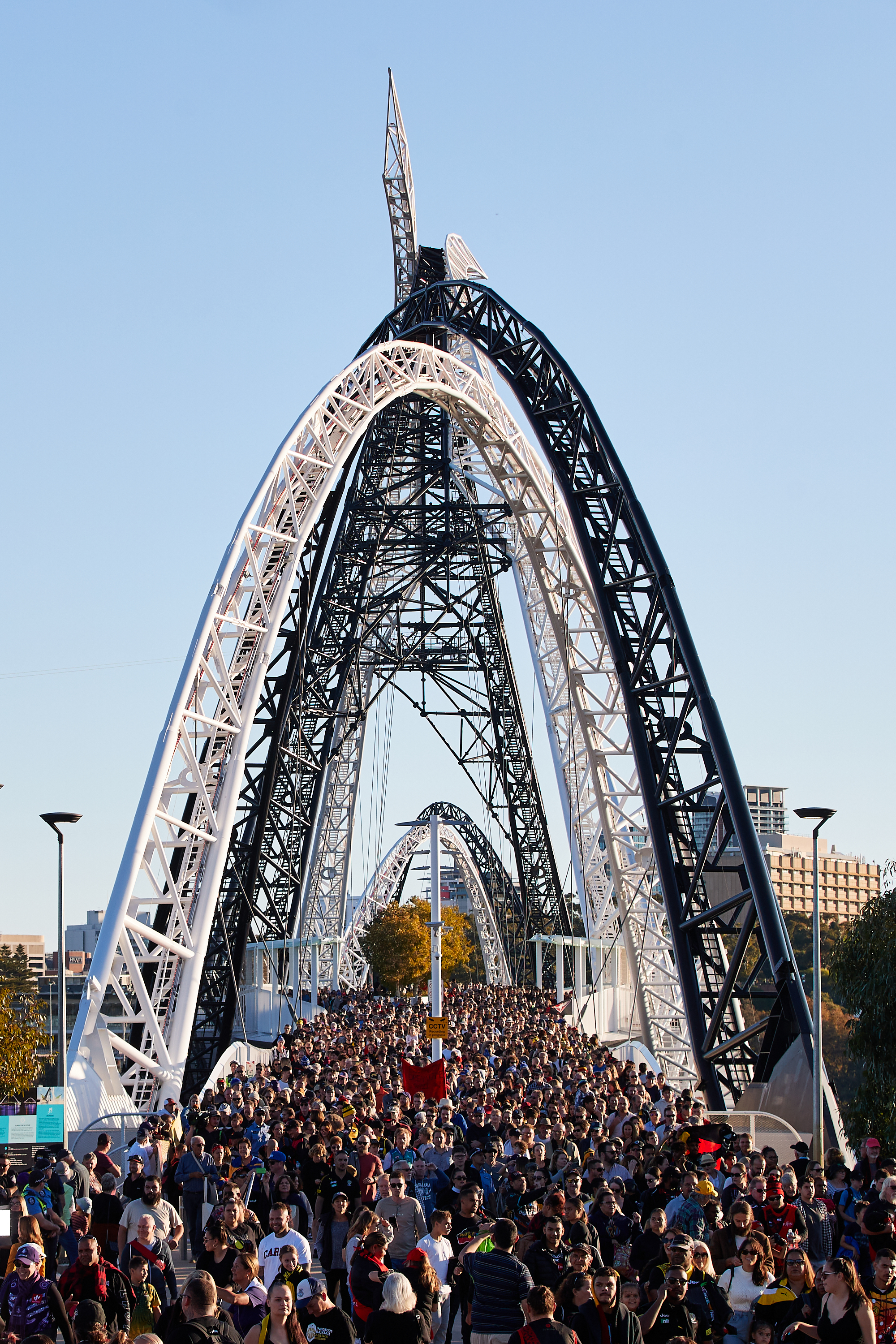 A photo of a large crowd walking across the Matagarup Bridge in Burswood, Perth