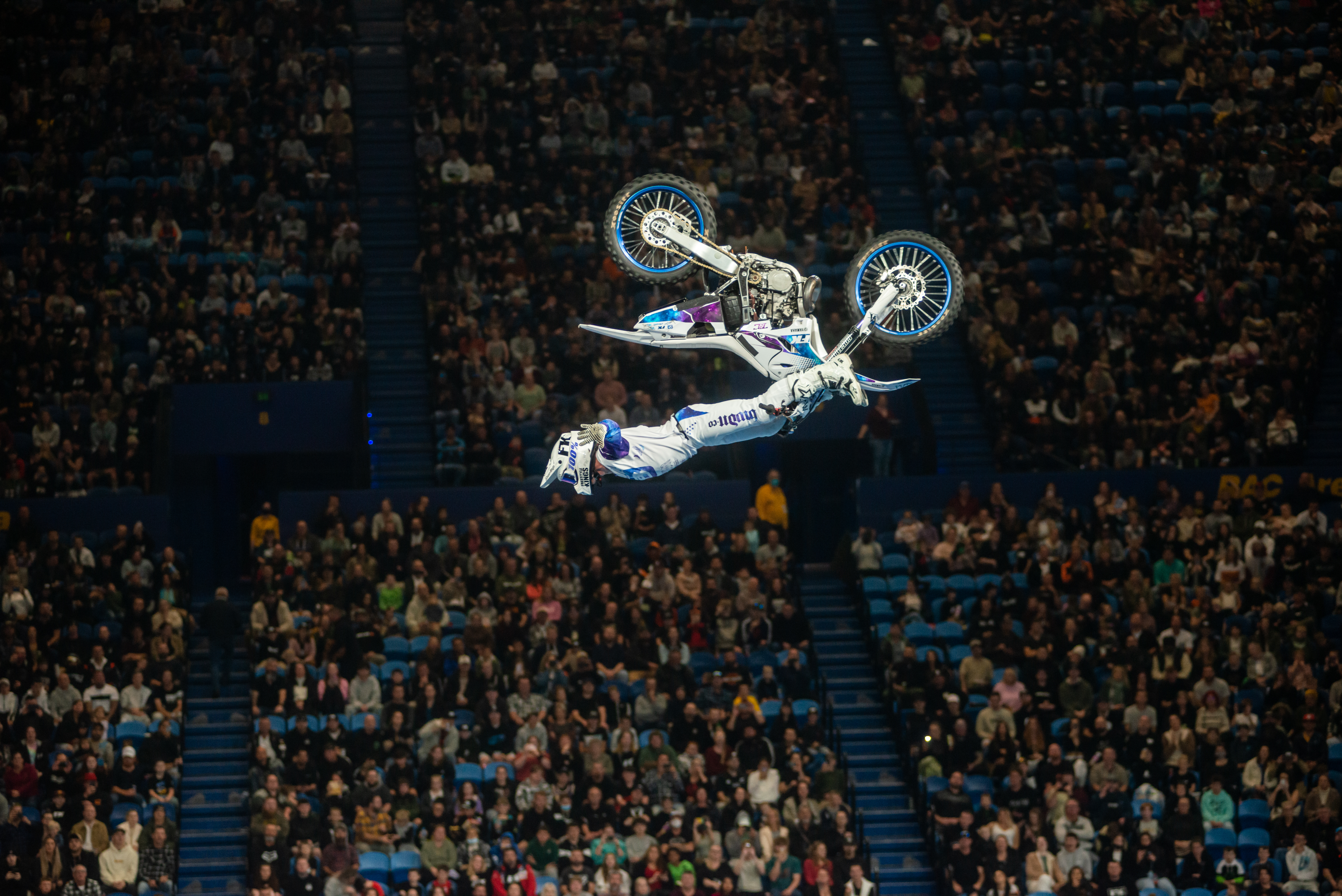 A photo of a motorcross rider as part of the Freestyle Kings performing doing a backflip whilst performing at RAC Arena in Perth
