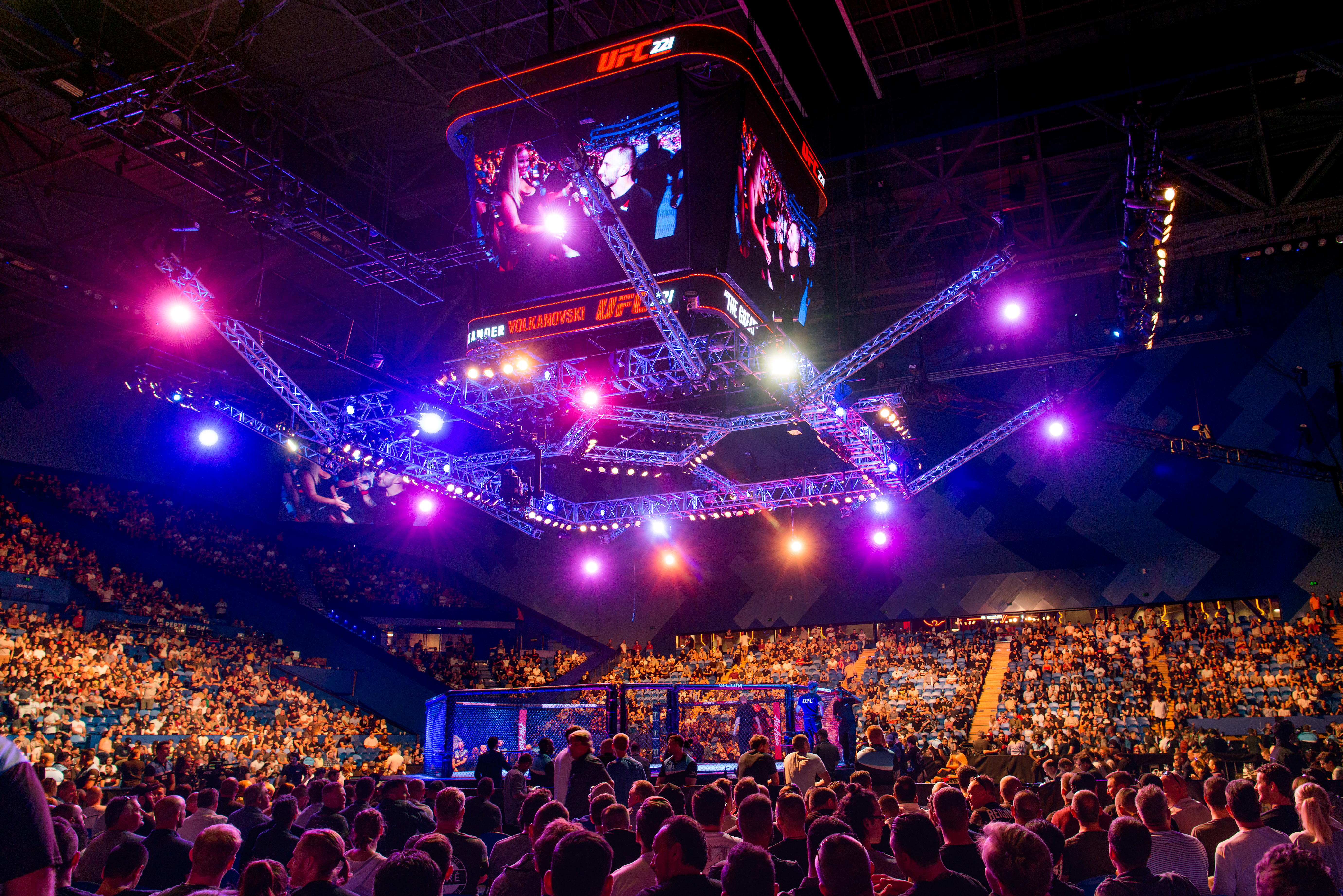 A photo taken from the crowd of a UFC match at RAC Arena in Perth