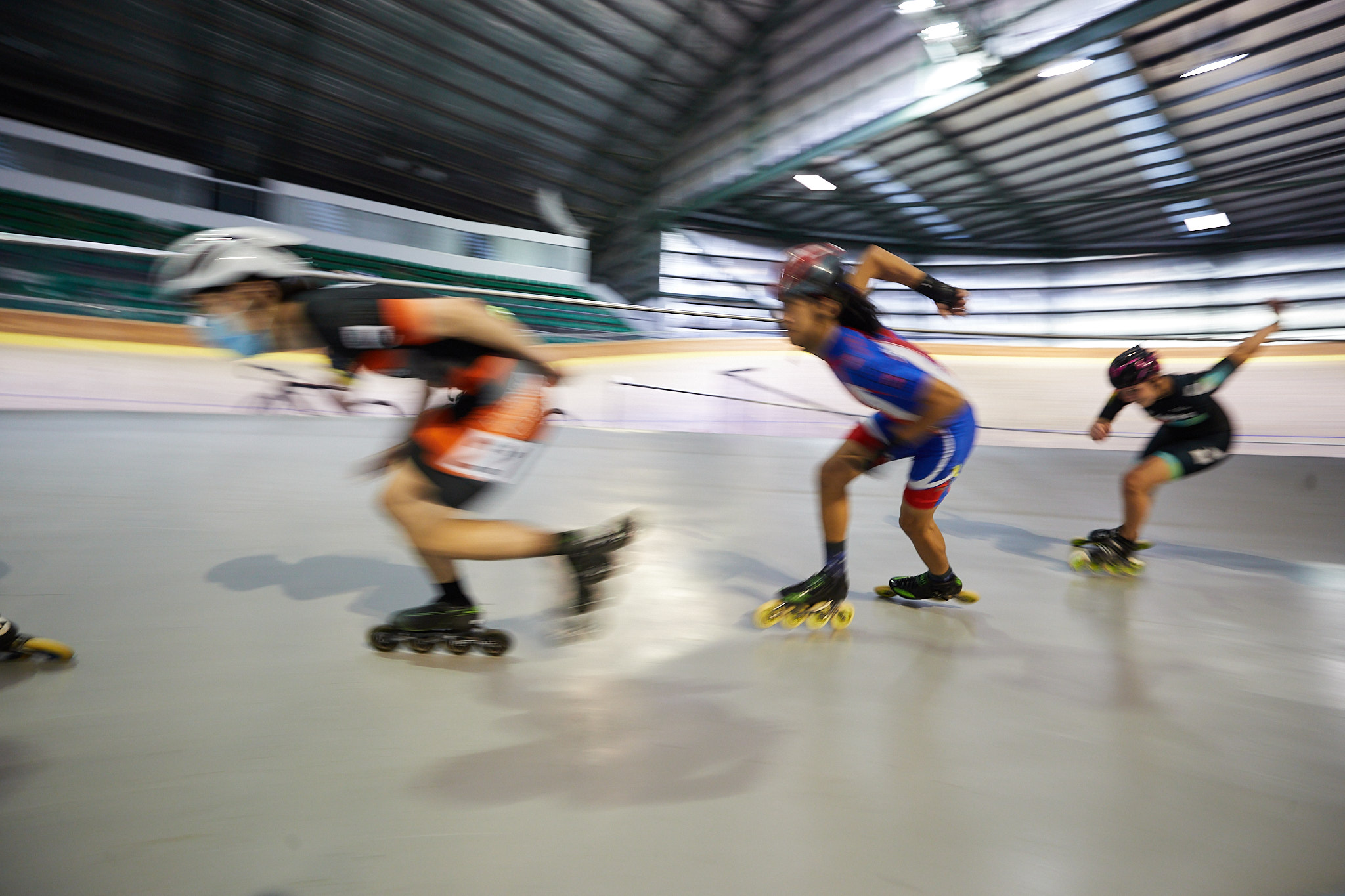 A photo of five participants engaging in speed hockey at the Speeddome in Middle Swan, Perth