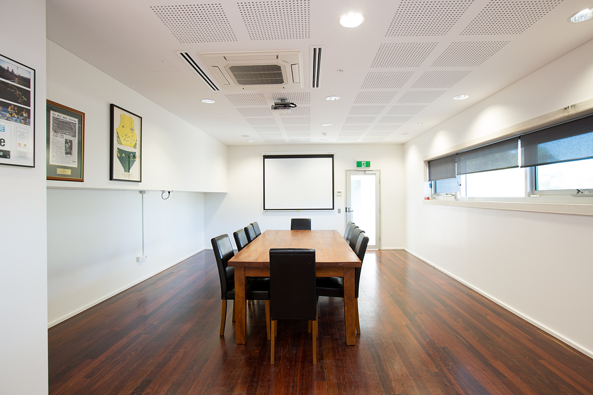 A photo of a wooden floored function room at the WA Athletics Stadium
